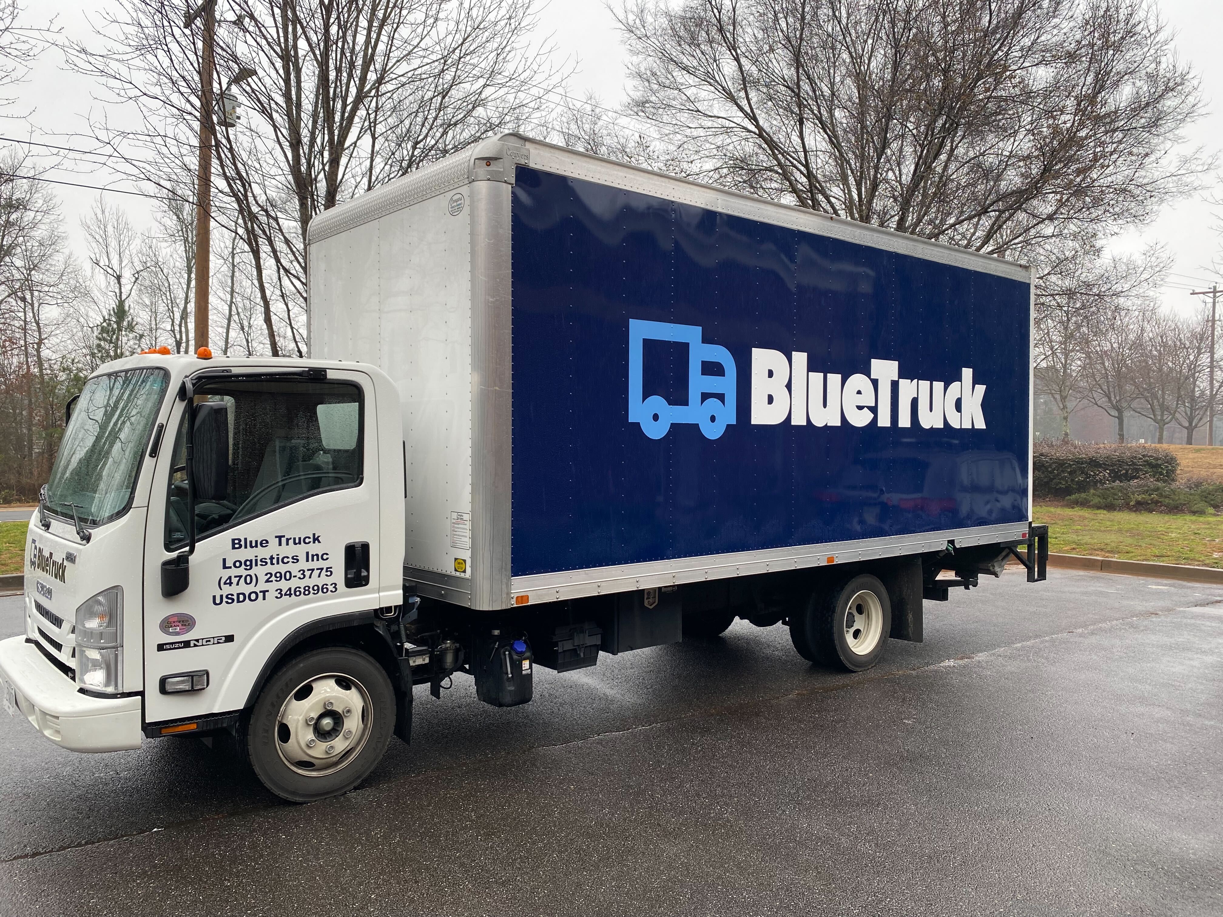 Blue truck delivery truck box truck
